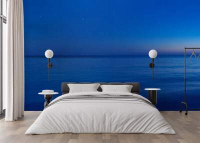 blue sky and sea in the night Wall mural