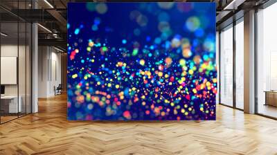 cloud of multicolored particles fly in air slowly or float in liquid like sparkles on dark blue background. Beautiful bokeh light effects with glowing particles. 2 Wall mural