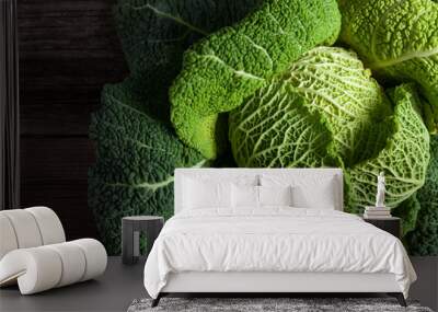 Savoy cabbage superfood closeup on dark wooden backround Wall mural