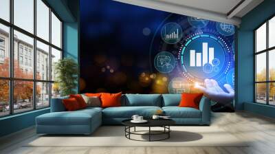 Business hand Worker holding Business analytics Big data analysis technology future concept on VR screen on blur background. Wall mural