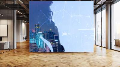 Double exposure of Asian woman using smart phone and Telecommunication tower with 5G cellular network antenna on smart city background Wall mural