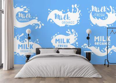 Milk product splash labels. Cartoon cow or goat milk with lettering, dairy milky splash logos, milk flow stamps with splashes flat vector illustration set. Milky splash elements Wall mural