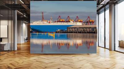 Closeup view of large transoceanic cargo ship docked in Docklands, Melbourne Wall mural