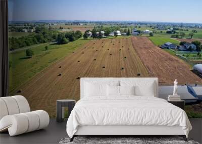 Aerial View of Amish Farmers Harvesting there Crops in Summer Wall mural