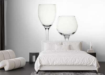 Two empty wine glasses isolated on white background Wall mural