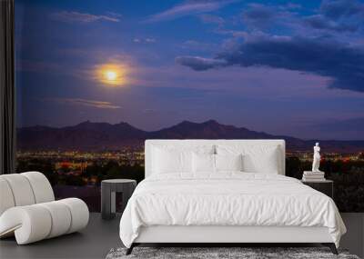 The moon rises over the city of Kingman, Arizona Wall mural