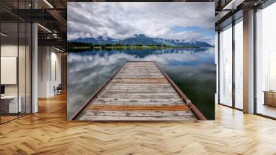 Landscape photo of dock on calm water. Wall mural