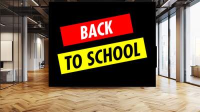 Two angled lines of text: Back to School. 1970s progressive poster style. White, red and yellow on black.
 Wall mural