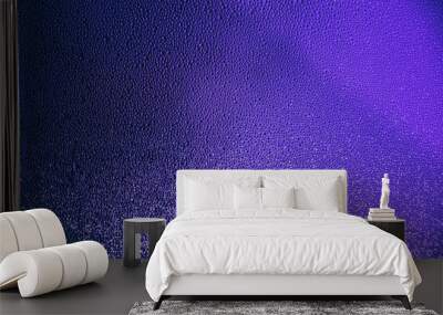 Abstract water drops on glasses window neon violet purple colored gradient background. Wallpaper. Wall mural