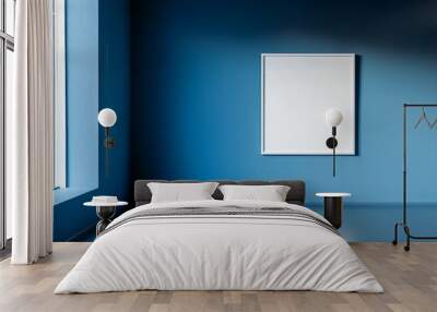 A blue color empty room with a white frame on the wall  Wall mural