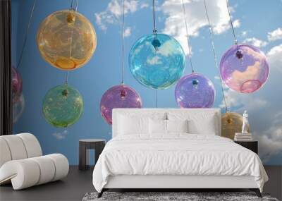 A series of floating, glowing orbs, each a different vibrant color, suspended in the sky, representing isolated yet vivid thoughts suspended in time  Wall mural