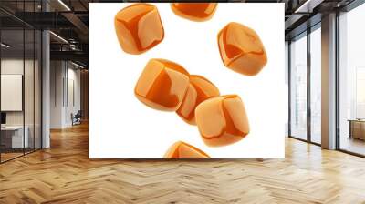 falling caramel candy, isolated on white background, full depth of field Wall mural