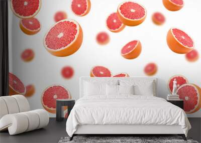 Falling grapefruits isolated on white background, selective focus Wall mural