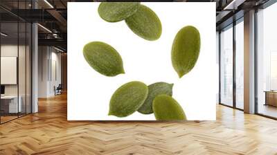 Falling Pumpkin seed, isolated on white background, full depth of field Wall mural