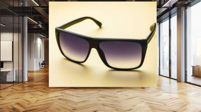 Sunglasses on a yellow colored background, summer concept Wall mural