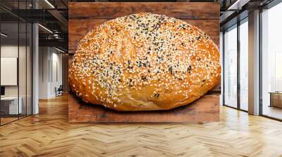 Artisan bread on wooden table Wall mural