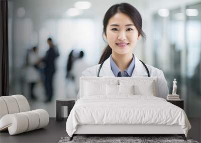 Asian female doctor in a hospital setting Wall mural