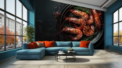 Shrimp on a plate against a black background. Wall mural