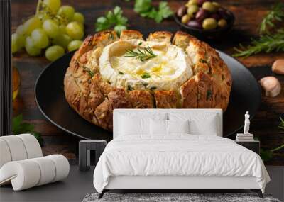 Baked Camembert cheese in sourdough bread with rosemary, garlic, thyme Wall mural