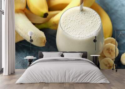 Banana smoothie in glass for healthy breakfast Wall mural