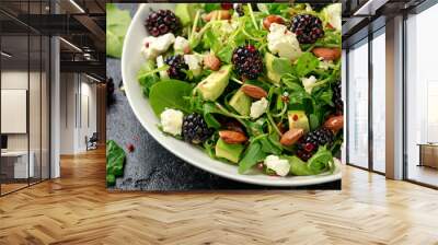 Blackberry salad with greens, almond nuts, feta, avocado and feta cheese Wall mural