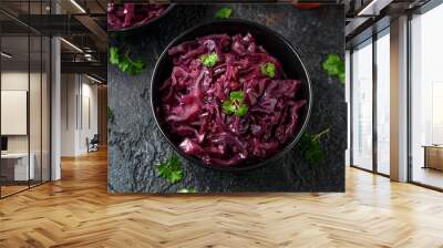 Braised Red Cabbage with apples and redcurrant in black bowl Wall mural