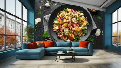 Crab salad with vegetables, radish, carrots, mango, pine nuts and prawn crackers Wall mural