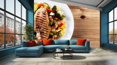 grilled chicken fillet, breast with cooked vegetable tomatoes, carrots, peppers, courgettes, brocoli Wall mural