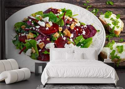 Healthy Beet Salad with fresh sweet baby spinach, kale lettuce, nuts, feta cheese and toast  melted  Wall mural