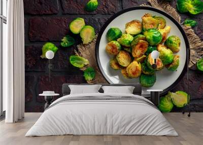 Homemade Roasted Brussel Sprouts with Salt, Pepper on a old stone rustic table. Wall mural