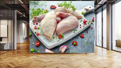 Raw Chicken breast supremes fillets with chilli, pepper corns and thyme on white wooden chopping board Wall mural