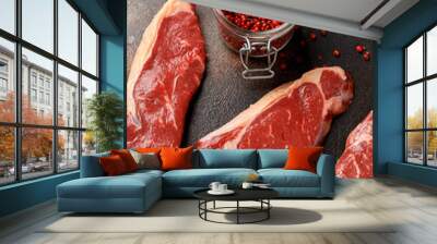 Raw fresh meat Sirloin Steak with rosemary and red peppercorn pepper Wall mural