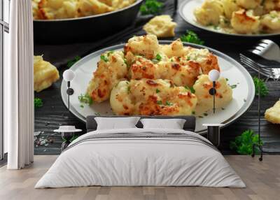 Roasted cauliflower with cheddar cheese sauce and herbs. Wall mural