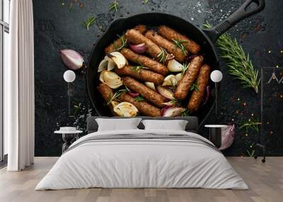 Rosemary and onion vegetarian vegan sausages oven baked in cast iron skillet frying pan Wall mural