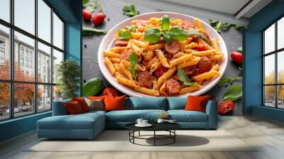 Sausage penne Pasta with tomato sauce and fresh herbs Wall mural