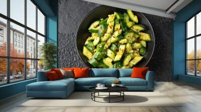 Smashed cucumber spicy Asian style salad with soy sauce dressing, chilli flakes, garlic and sesame seeds Wall mural