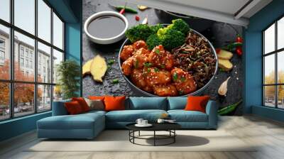 Teriyaki chicken, steamed broccoli and wild rice served in two Asian clay bowls Wall mural