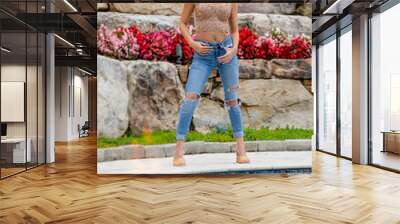 A Lovely Blonde Model Poses Outdoor While Enjoying The Spring Weather Wall mural