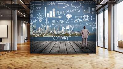 Businessman looking at Innovation plan. Wall mural