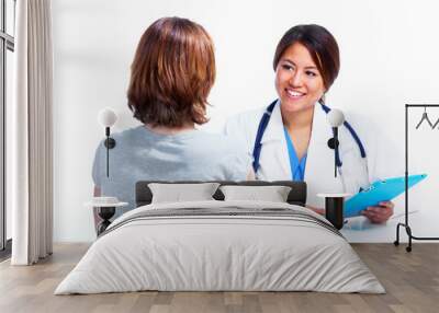 Chinese medical doctor woman with patient. Wall mural