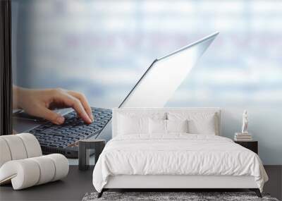 hands typing on computer laptop. Wall mural