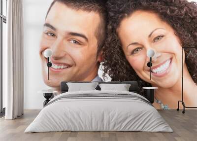 Happy couple in love. Over white background Wall mural