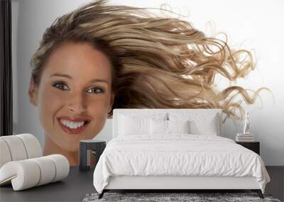 Pretty girl with great fly-away hair. Over white background. Wall mural