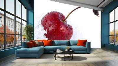 Red cherry in snow. Wall mural