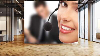 Smiling  pretty business woman with headset. . Wall mural