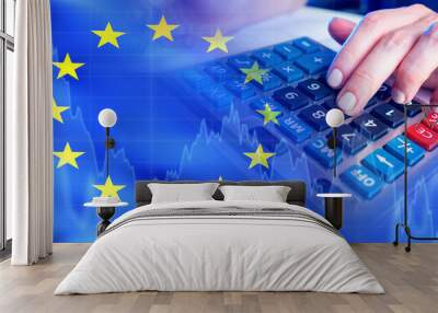 EU financial market. Flag of European union. Hands on calculator. Falling chart metaphor for crisis. Recession in European union. Economic crisis in Europe. Losses from investments in EU. 3d image Wall mural