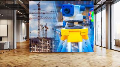 Monitoring the progress of construction works. The measuring tool allows you to measure the angles of inclination. Quality of construction work. The use of theodolite in the construction. Wall mural