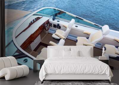 Speedy motor boat. Boat trips. An empty cabin of a motor boat. Leather seats and wooden trim of a luxury yacht. Sale of passenger ships. Recreation on the water. Wall mural