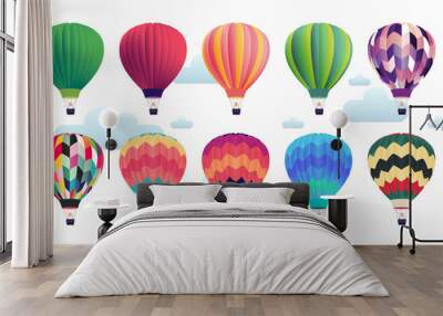 Hot air balloons - set of various colored balloons in the sky with clouds Wall mural