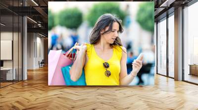 Beautiful Young Woman Having Fun in Shopping Wall mural